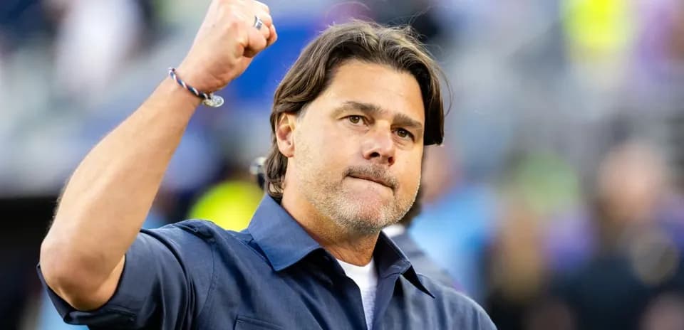 Coach raising fist during game celebration
