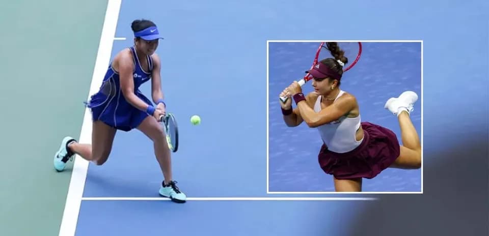 Female tennis player returning a serve on court