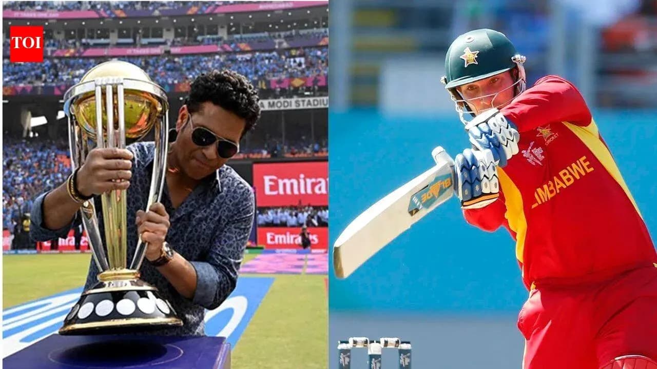 Sachin Tendulkar holding a cricket trophy, batsman batting