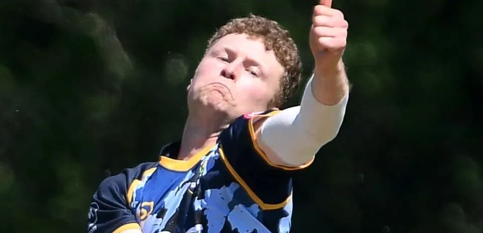 Bowler delivering ball with thumbs up gesture