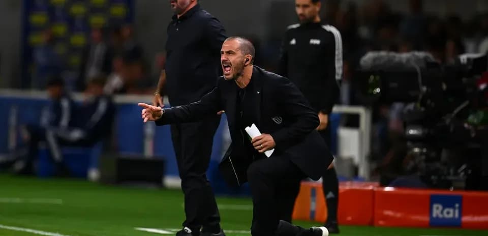 Coaches directing players during a match on the sidelines