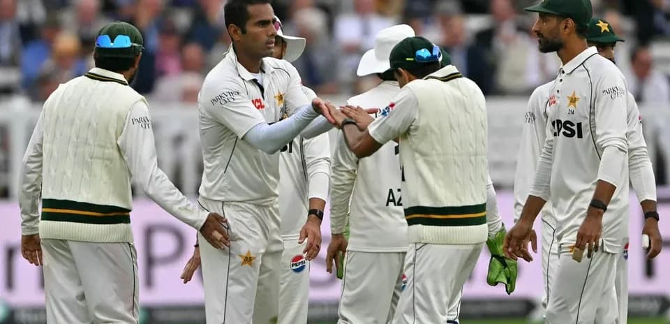 Pakistani players celebrating a wicket on the field