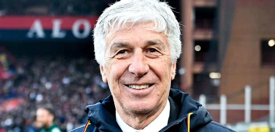 Coach smiling during match at the stadium