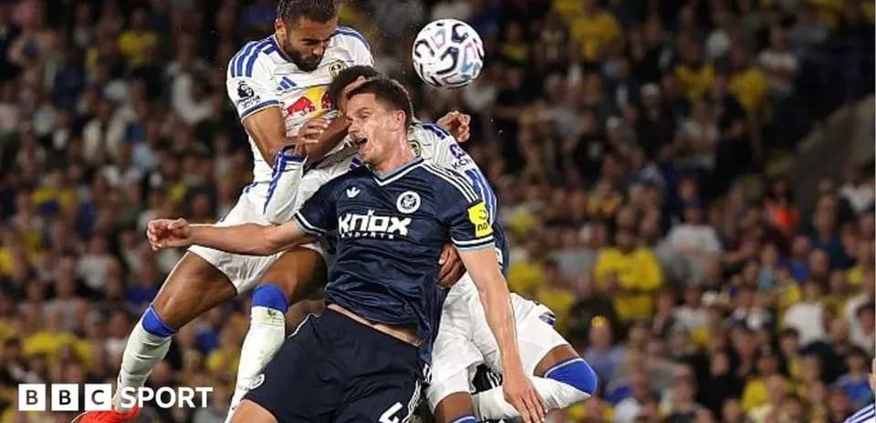 Players contesting for the ball during match action