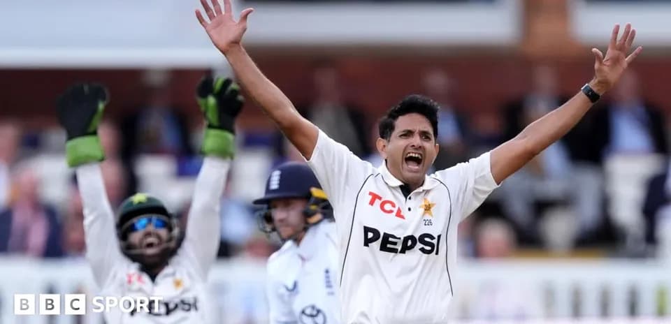 Bowler celebrating a wicket with wicketkeeper behind