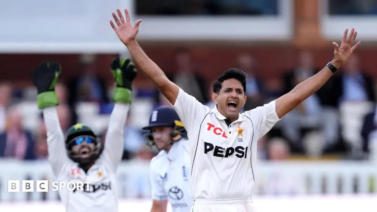 Bowler celebrating a wicket with wicketkeeper behind