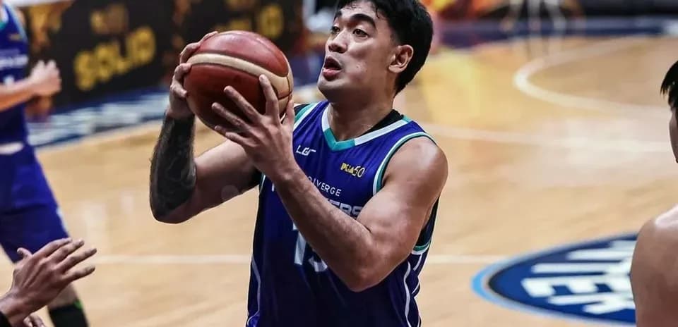 Player shooting a basketball during a game