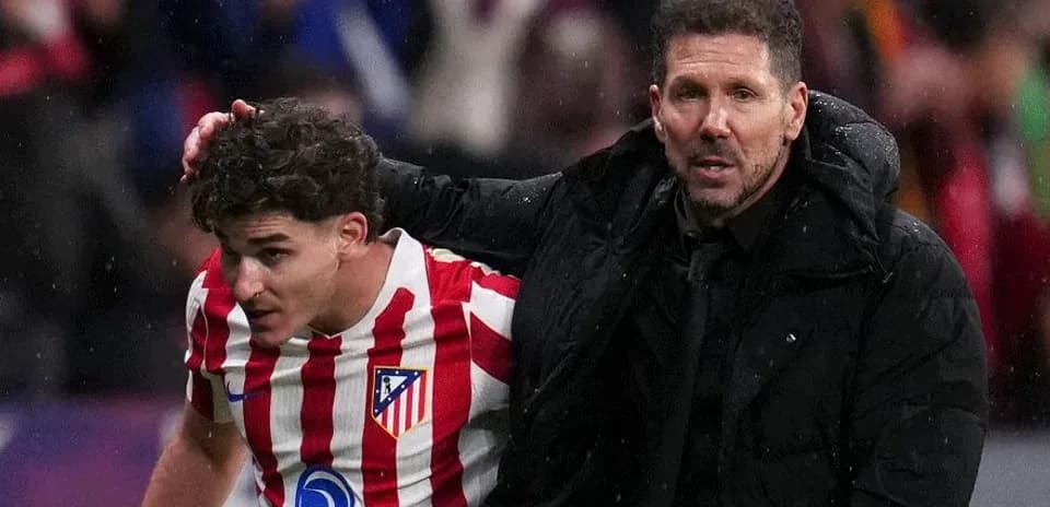 Atletico Madrid player and coach during match