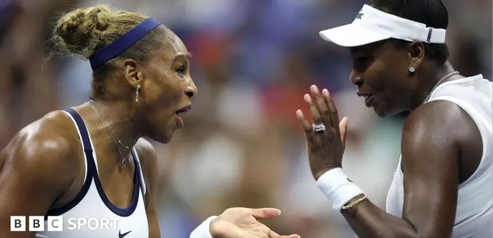 Venus and Serena Williams discussing during match