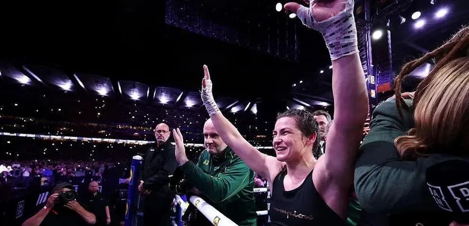Boxer celebrating victory in the ring