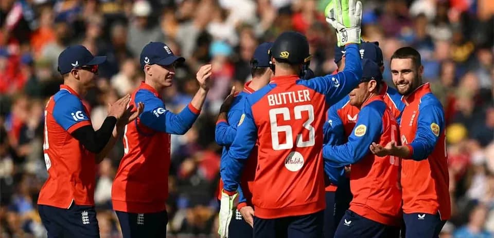 England cricket team celebrating a wicket on field