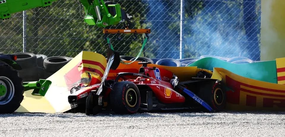 Formula 1 car crashed into barriers with recovery equipment