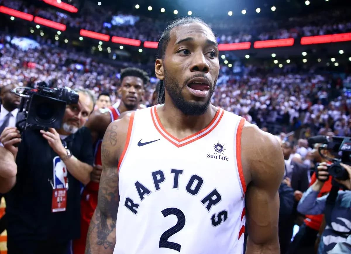 Kawhi Leonard leaving court after playoff victory