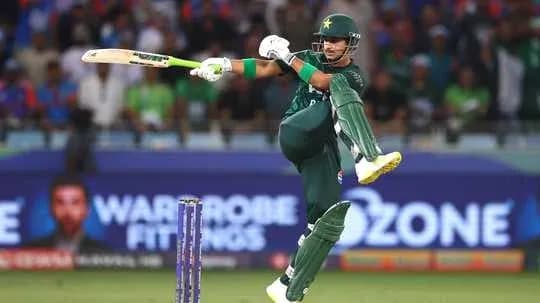 Batsman hitting a cricket ball in match