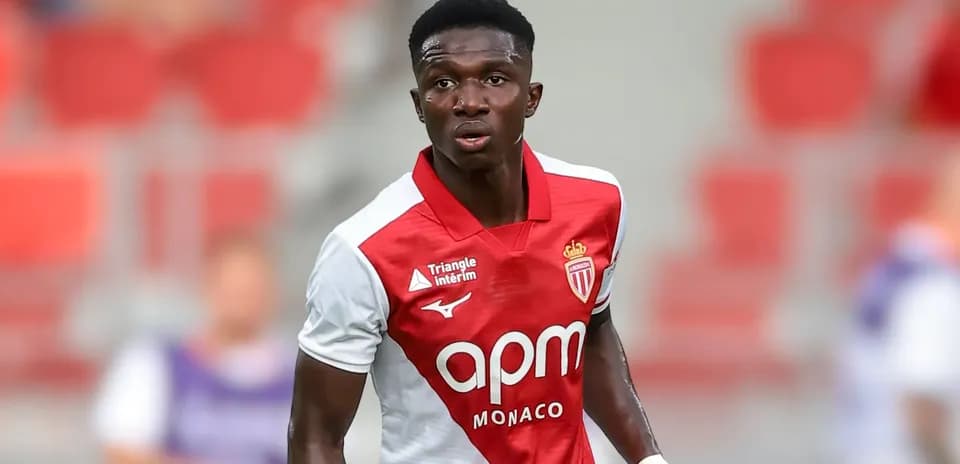 Player in AS Monaco kit during a match