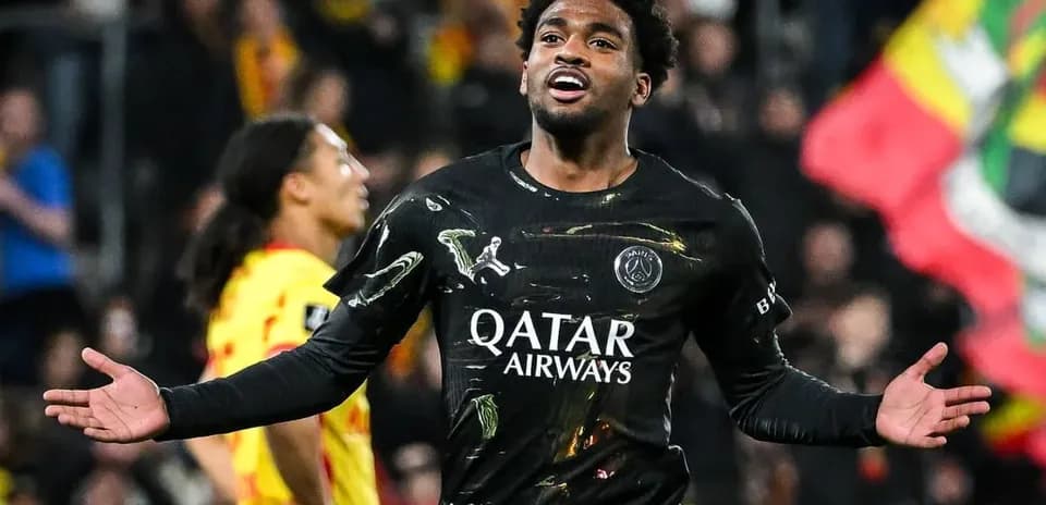 Player celebrating a goal in PSG jersey