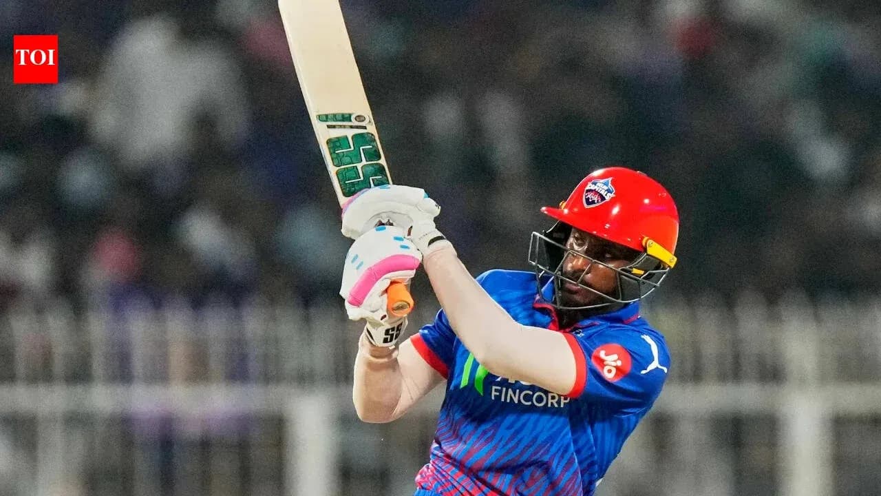 Batsman playing a shot during cricket match
