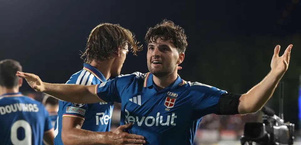 Players celebrating a goal during a match