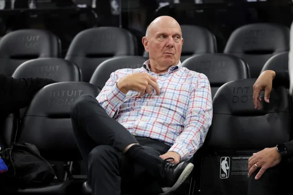 Man seated courtside at Intuit Dome