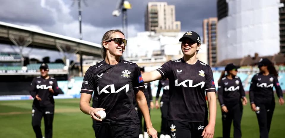 Players celebrating on the field after match