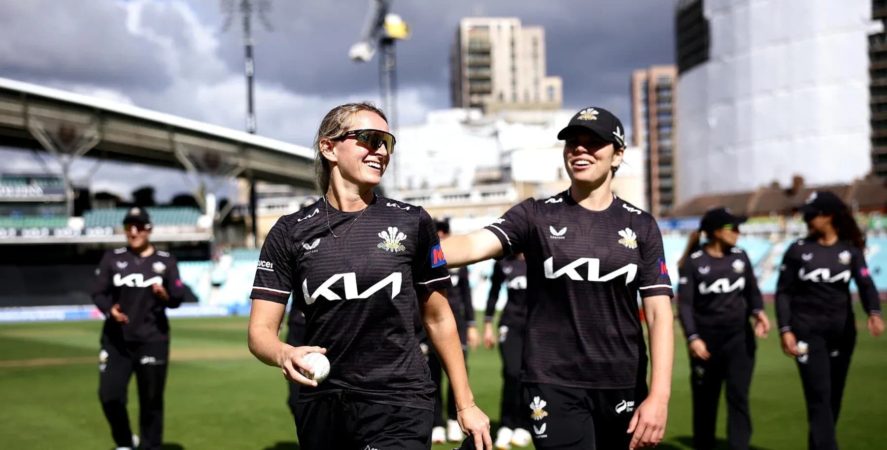 Players celebrating on the field after match