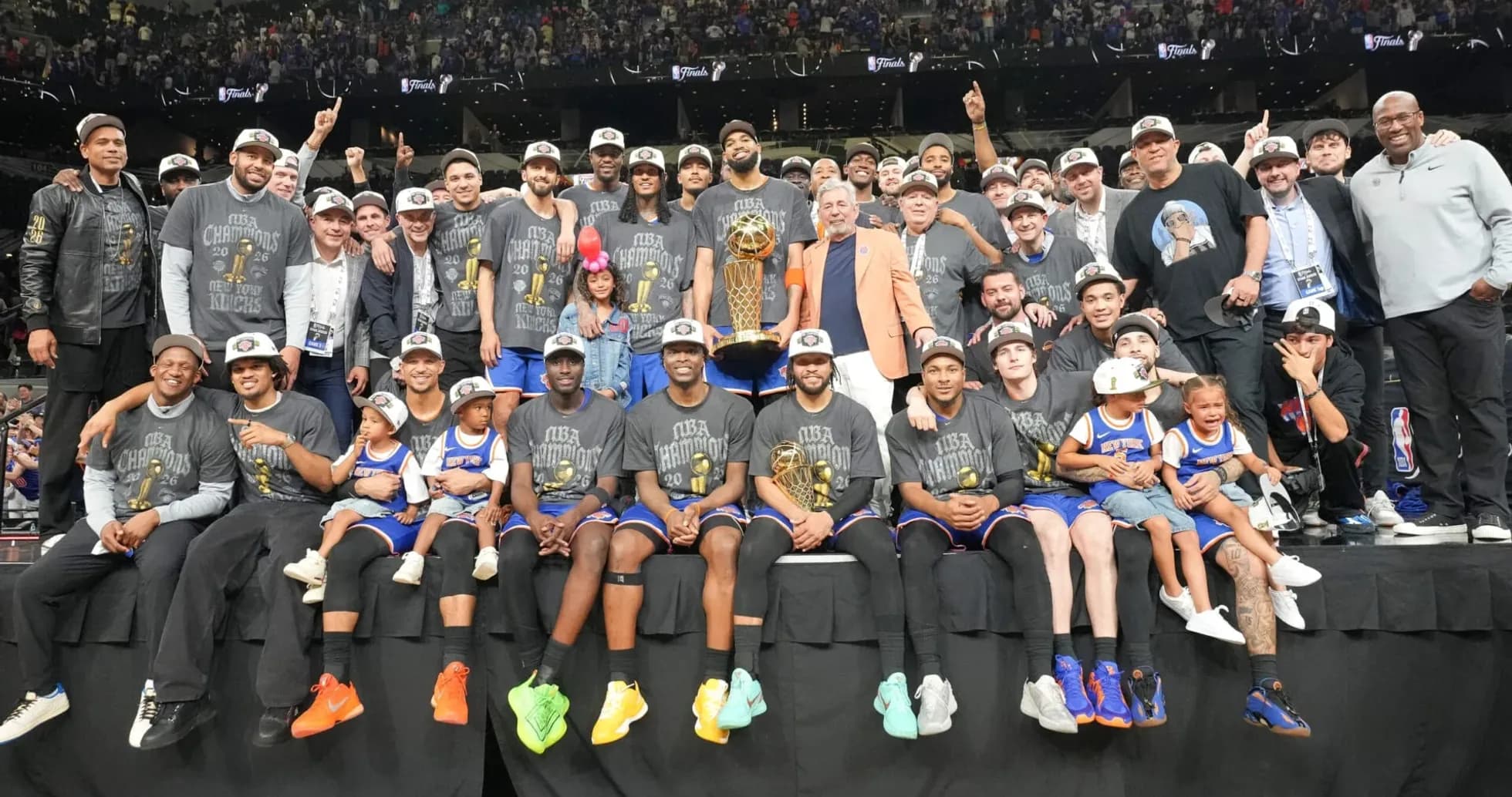 New York Knicks celebrating NBA championship victory with trophy