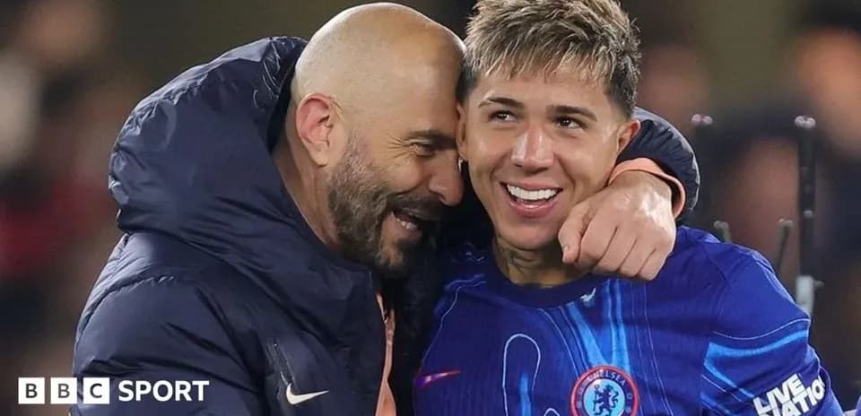 Coach and player celebrating together after match