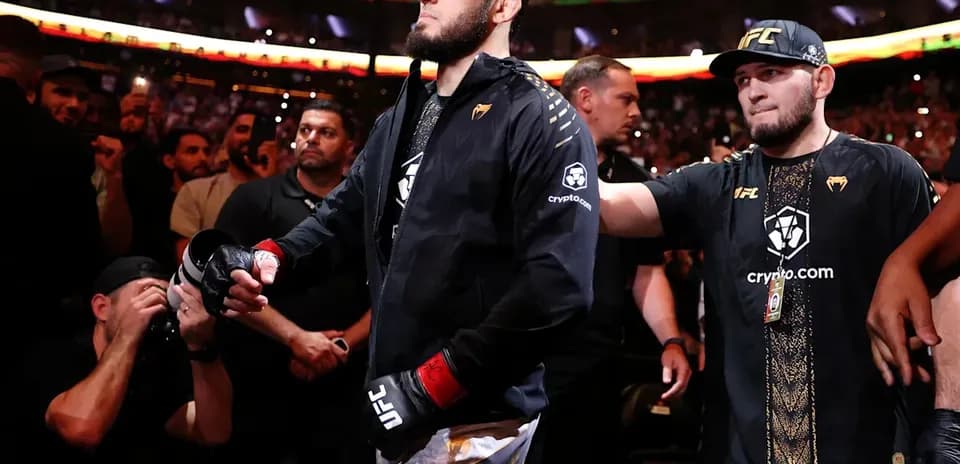 Fighter entering arena with team before match