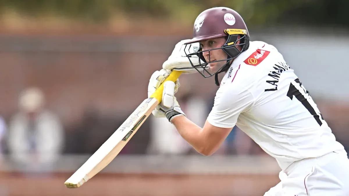 Batter playing a shot during cricket match