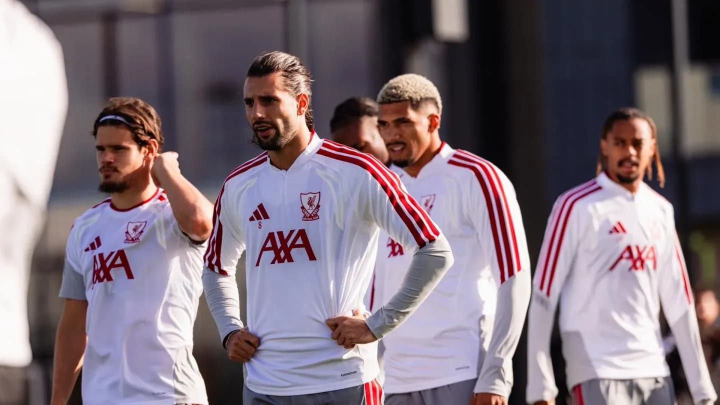 Players in Liverpool training kits during practice session