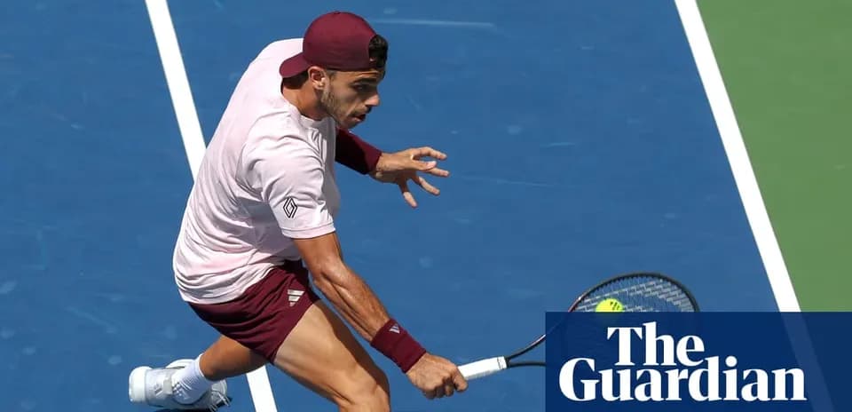 Tennis player executing a forehand shot on court