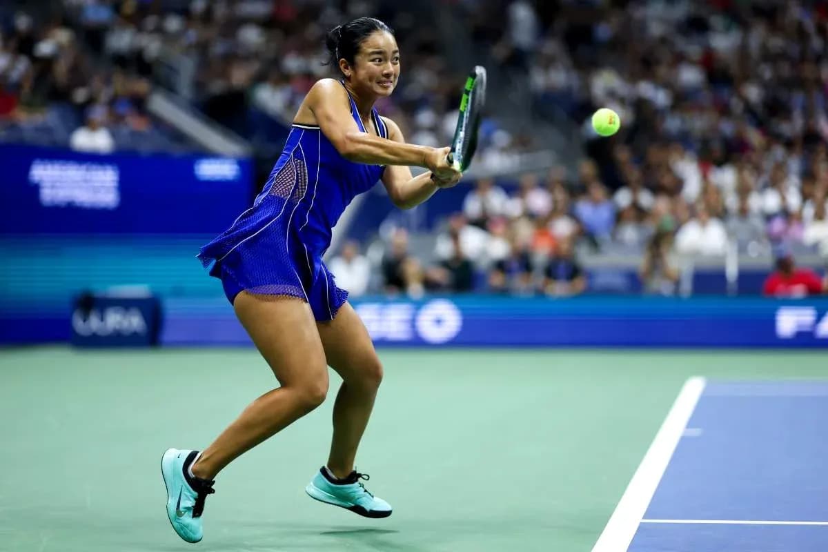 Player hitting a backhand during tennis match