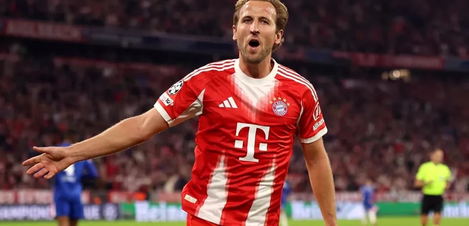 Player celebrating a goal in Bayern Munich jersey