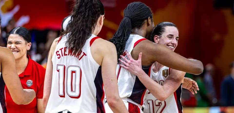 Players celebrating after a game, embracing each other