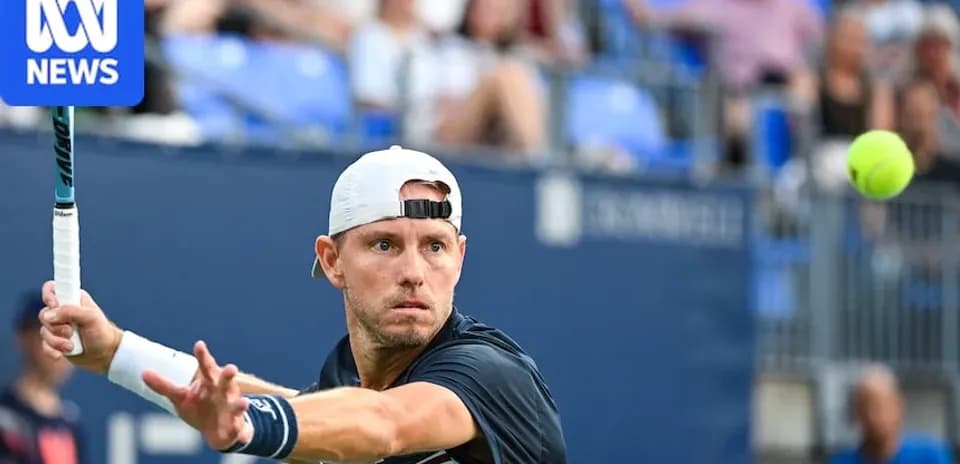 Tennis player preparing to hit a forehand shot
