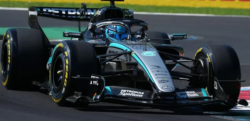 Mercedes F1 car racing on track during event