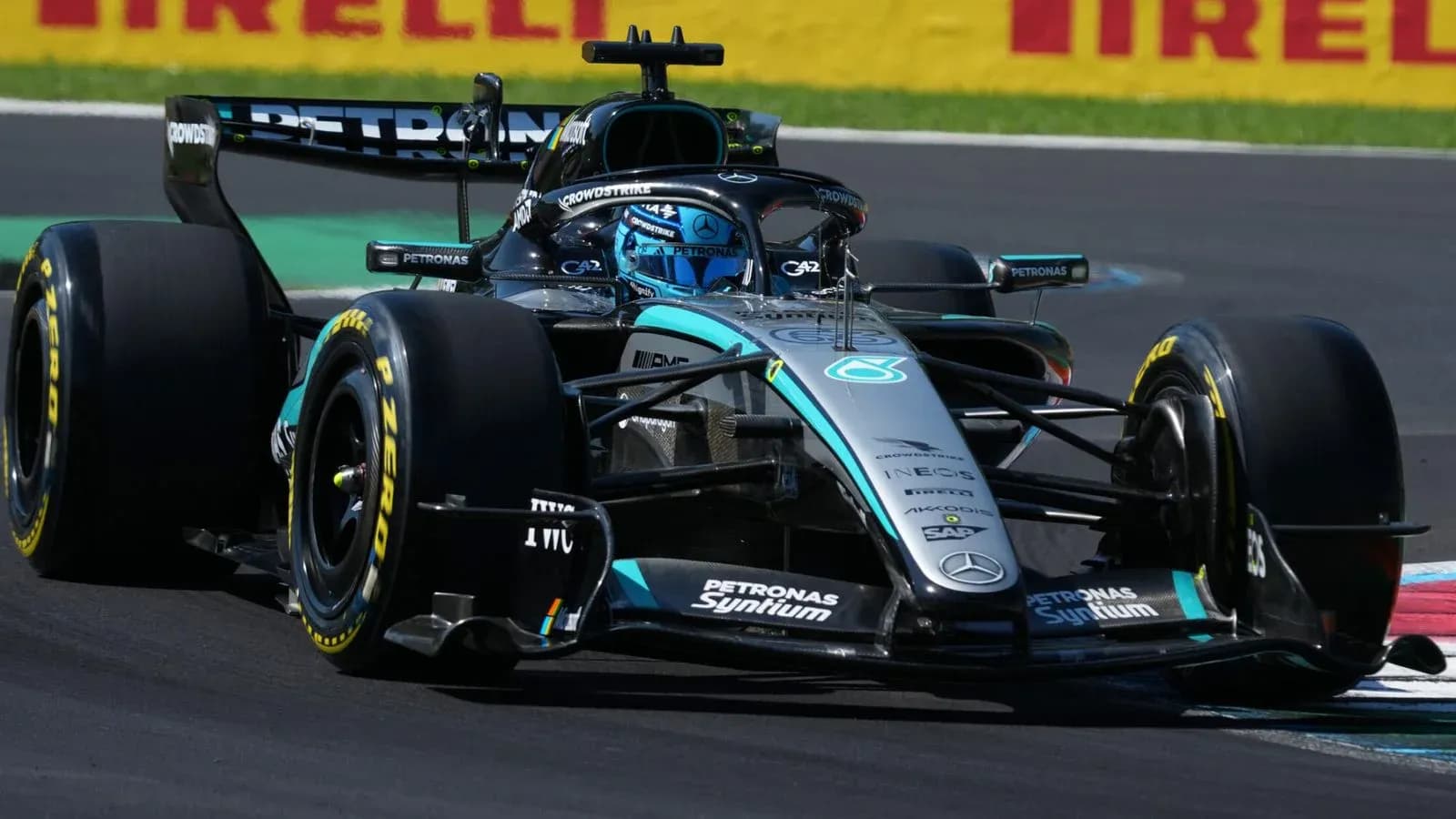 Mercedes F1 car racing on track during event