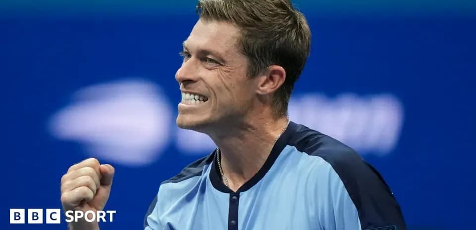 Tennis player celebrating a point during match