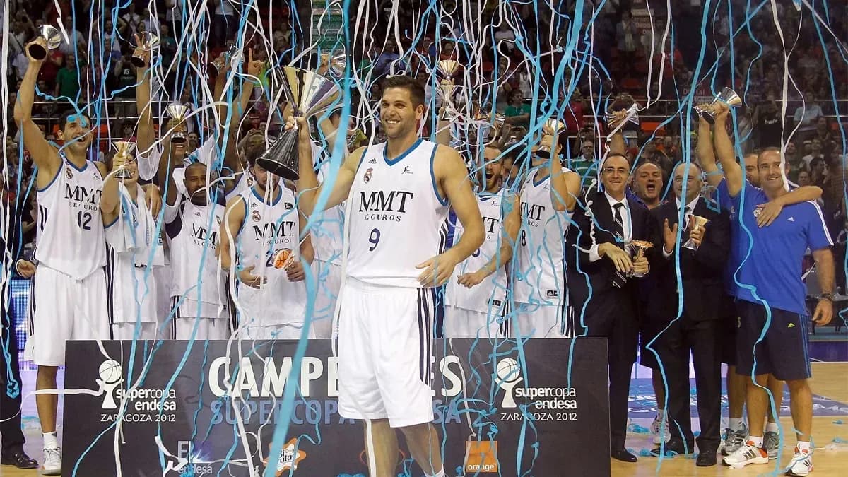 Basketball team celebrating victory with trophies