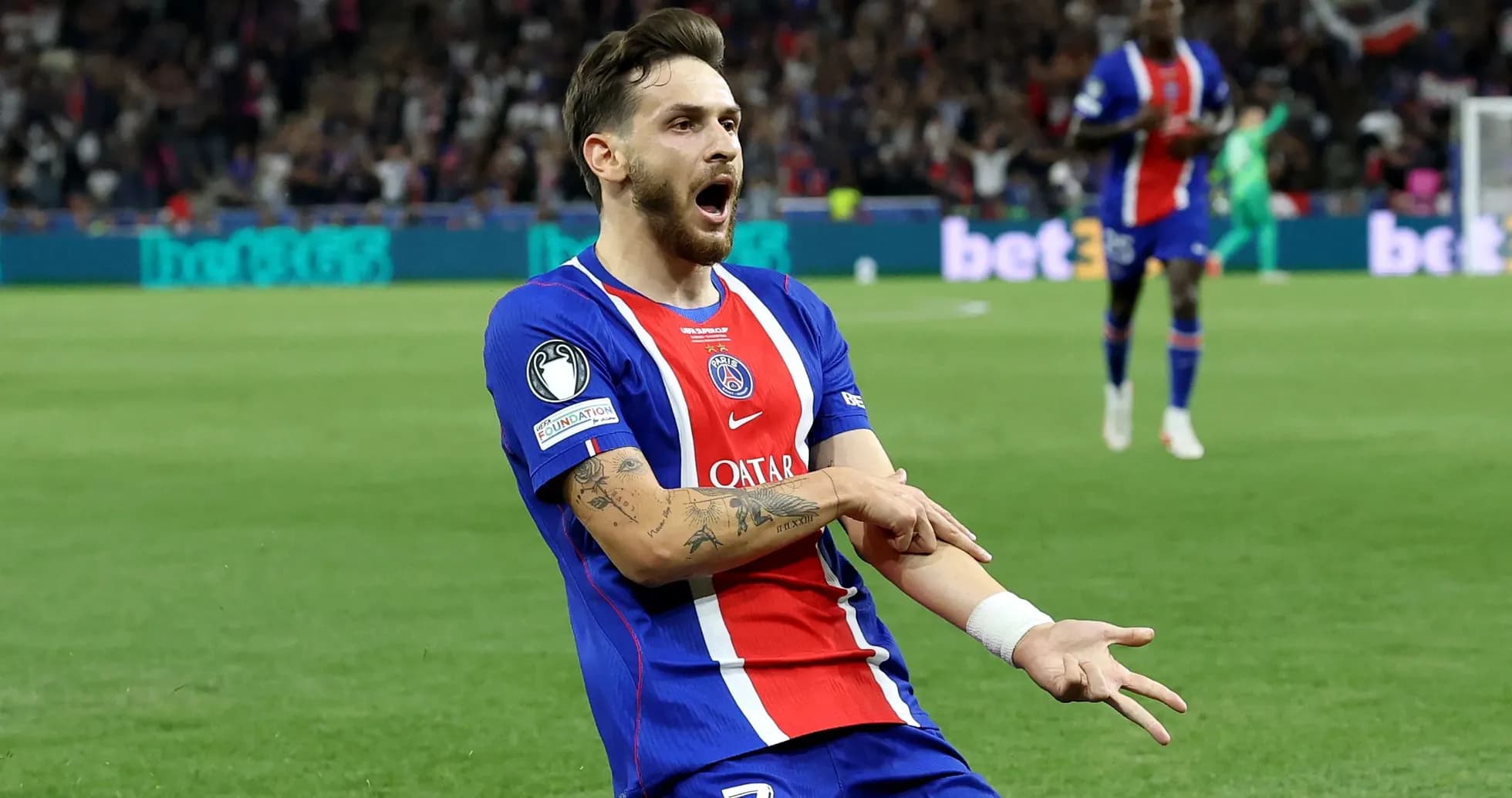 Player celebrating a goal on the pitch