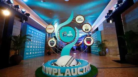 WPL auction display with logos and decor