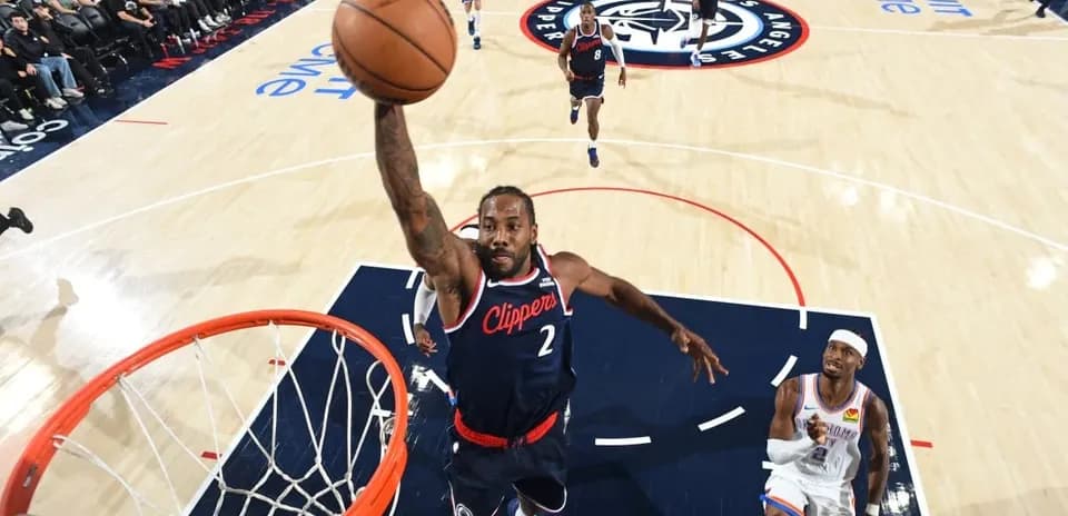 Player dunking the basketball during a game
