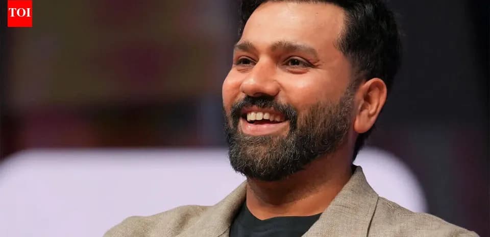 Smiling man in a blazer during event