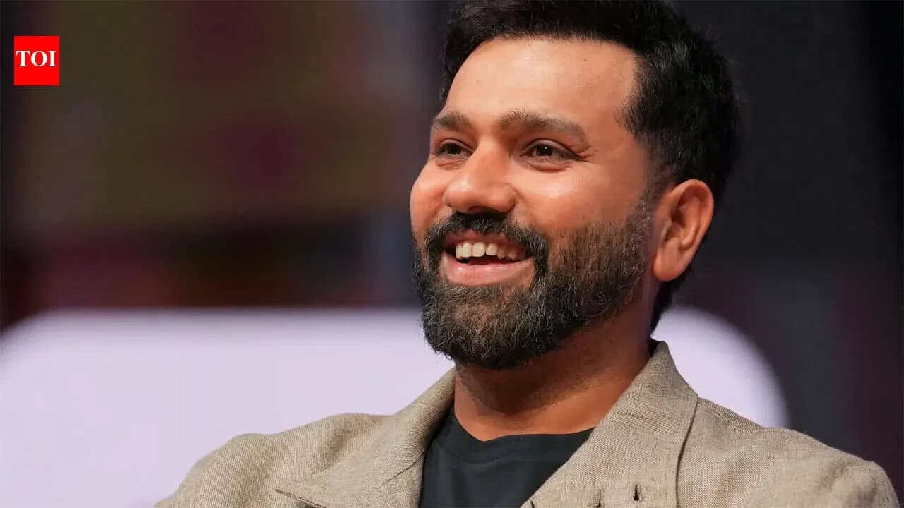 Smiling man in a blazer during event