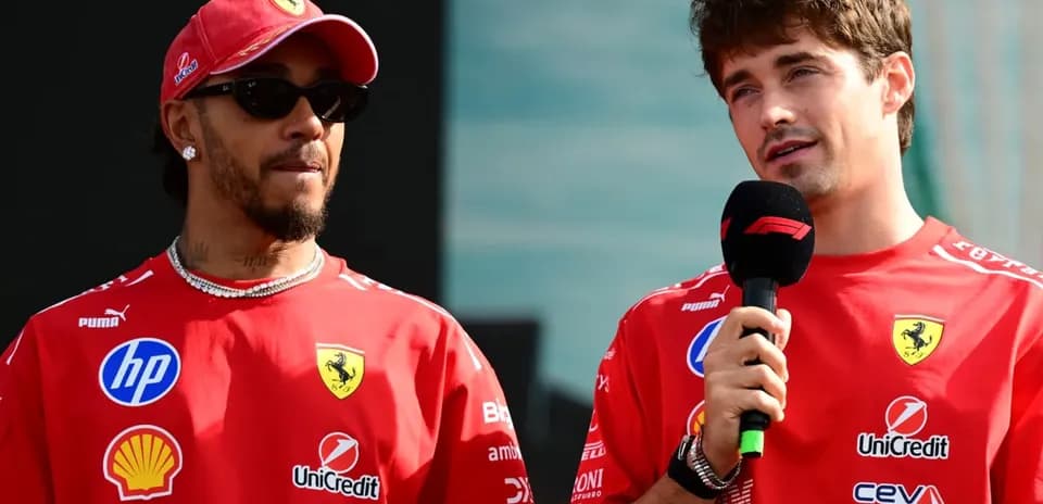 Two drivers in Ferrari shirts during press event