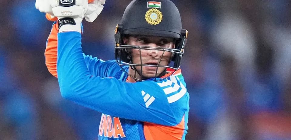 Cricketer preparing to bat during match