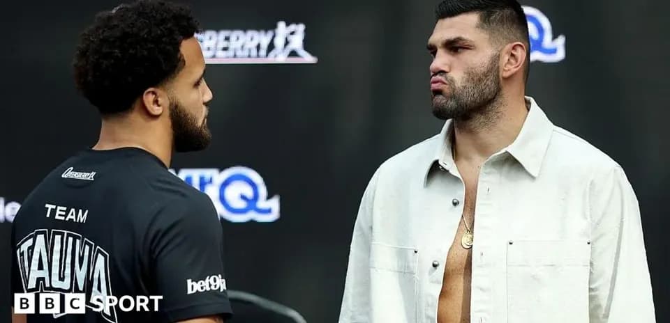 Two boxers facing off at press conference