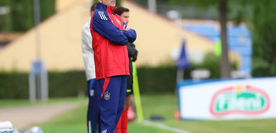 Coach observing from the sidelines during training session