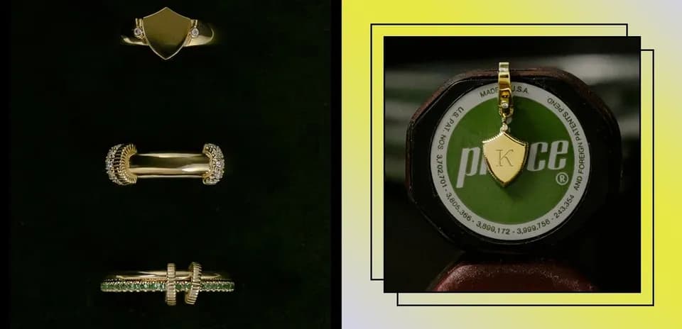 Collection of gold rings and a pendant displayed