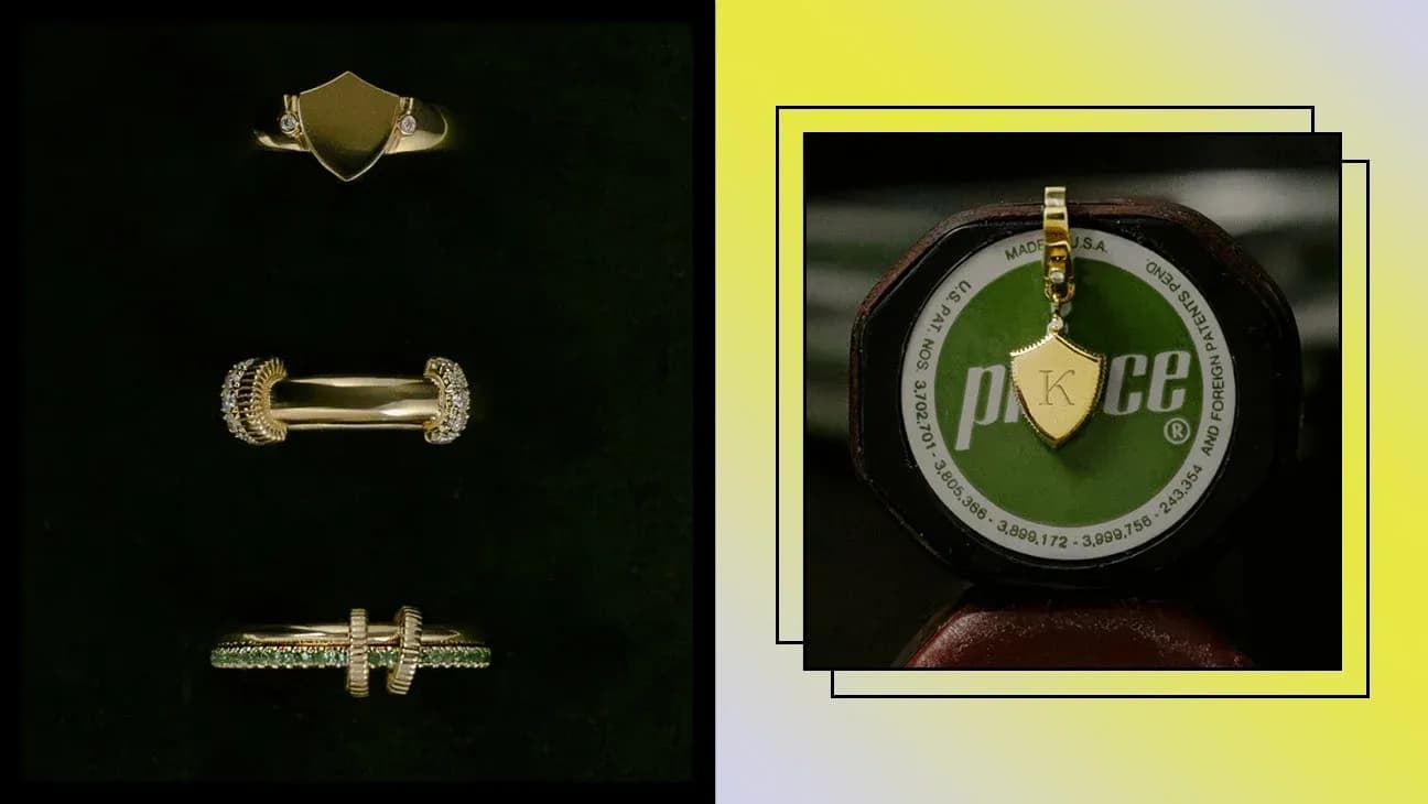 Collection of gold rings and a pendant displayed